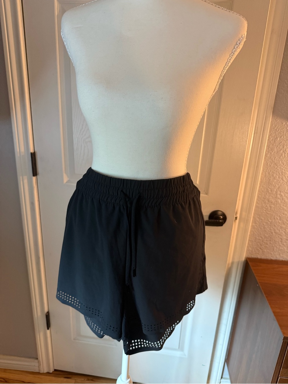 Athleta Black Athletic Shorts with Laser-Cut Hem